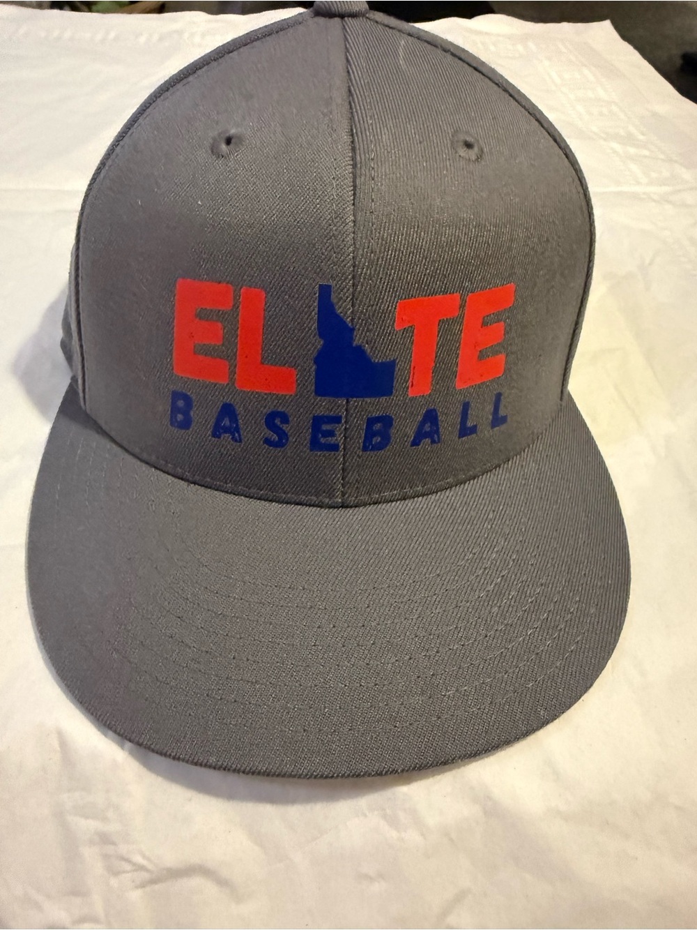 Elite Baseball Grey Snapback Hat with Red & Blue Logo